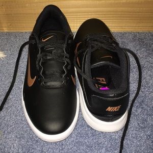 Women’s Nike golf/hiking sneakers with spikes